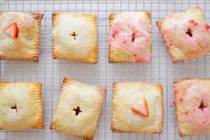 strawberry hand pies on a cooling rack ready to be baked in the oven for dessert