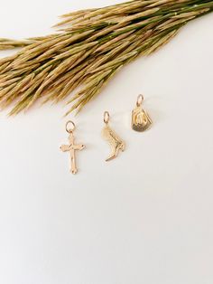 Expand your jewelry collection by adding to your necklace, bracelet, and earring sets! How to match check pic# 8 and pic #9Item Details:• This listing is for ONE(1) Charm.• Metal Type: 14K gold filled and sterling silver.Cross 27x16mmCowboy boot 15x19mmCowboy hat 12x16mmWear it 24/7 without worries.Wear it alone or pair it with your favs! Matching jewelry: Mix and Match 14k Gold Filled Charms Jewelry As Gift, Small Dainty Charms Jewelry, Dainty Small Charms Jewelry, Spiritual 14k Gold Charm Necklaces, Adjustable Gold Sterling Silver Charms, Nickel-free Gold-plated Charms As Gift, 14k Gold-filled Pendant Charm For Gift, 14k Gold Filled Pendant Charm For Gift, Nickel-free Gold-plated Charms Gift