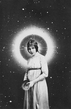 a woman standing in front of a star filled sky