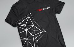 a black t - shirt with white lines and red text on it that says ted cardiff