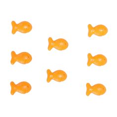 small orange plastic fish on a white background