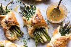 asparagus and cheese pastries with dipping sauce