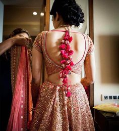 Bridal # tassel love # lehenga # sexy back Lehenga Tassels, Lehenga Looks, Unique Lehenga, Ombre Lehenga, Sabyasachi Lehenga, Backless Blouse Designs, New Saree Blouse Designs, Traditional Blouse Designs, Bridal Lehenga Collection