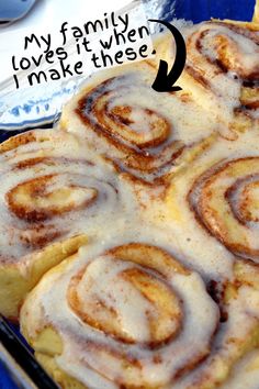 a close up of a cinnamon roll on a pan with the words my first time loves it when i make these