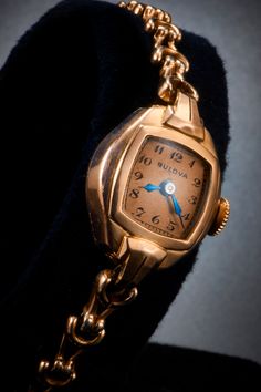 "Join our mailing list and receive 10% off your order: https://bit.ly/3puxhHb Dainty and Elegant 1941 mechanical Bulova cocktail watch. This watch features a 14k rolled rose gold plate marquise case, square bronze dial with Printed Arabic markers. Dainty heirloom estate jewelry you can wear everyday. Stretch rose gold bracelet made in USA. 5.5\" at rest. Fits wrists to max 8.5\"/21.6cm circumference. The best part? This watch is in excellent condition. We lovingly restored and calibrated the Swi Cocktail Watch, Rose Gold Plate, Heirloom Jewelry, Vintage Watches Women, Vintage Timepiece, Heirlooms Jewelry, Gold Cocktail, Rose Gold Bracelet, Copper Bracelet