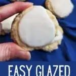 a person holding a sandwich in their hand with the words easy glazed donuts on it