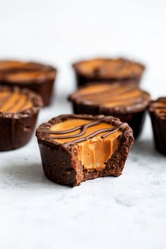 chocolate cupcakes with peanut butter frosting on top