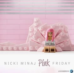 a pink brick wall with a lego girl on it and the words nicki mina pink friday