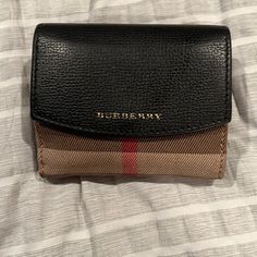 Burberry House Print Check Derby Canvas/ Leather Tri Fold Wallet Canvas/ Leather Tri Fold Wallet In Great Condition. This Wallet Is The Perfect Size For Any Bag And Kept In Great Condition. Comes With Original Box And Dust Bag. Fold Over Flap That Can Hold Change Slip Pocket Cash Compartments Tri Fold Wallet, Heart Coin, House Print, Burberry Wallet, Burberry Vintage, Card Case Wallet, Fold Wallet, Zip Wallet, Trifold Wallet