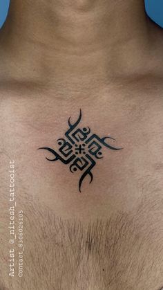 the chest is covered with black ink and has an intricate design on it's chest