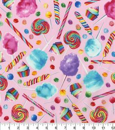 a pink background with candy and lollipops on it