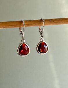 + + + + + PLEASE READ THE DESCRIPTION + + + + + Faceted Red Glass Drops 10 x 10mm  Silver Plated Lever back Ear Clasps. The total length is 1 inch or  27mm long. Your order will be wrapped and shipped in jewelry gift box.  If you would like to order this item as a gift you can leave a personalized note for the receiver during a checkout process, there will be "Gift  details" option to add a message. Please enter my shop here - www.etsy.com/shop/ZarinaJewelry or my FB page www.facebook.com/ZarinaJewelry Birthday Gifts For Daughter, Gifts For Daughter, Small Earrings, Red Glass, Jewelry Gift Box, Ruby Red, Jewelry Gift, Jewelry Earrings Dangle, 1 Inch