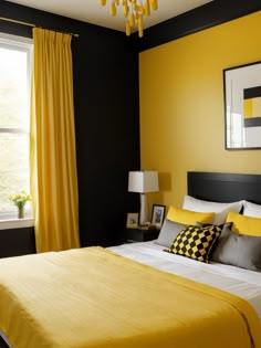 a yellow and black bedroom with a chandelier hanging from the ceiling above the bed