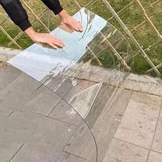 a skateboarder doing tricks on the edge of a ramp