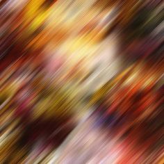 an abstract image of multicolored trees in the fall or winter with oranges, yellows and reds