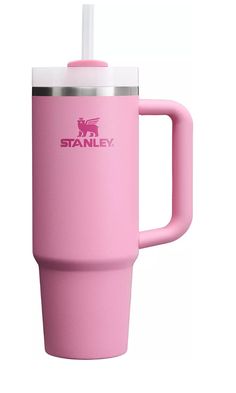 a pink travel mug with a straw sticking out of it