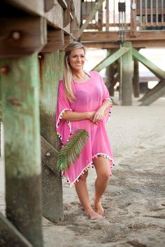 This cover up is so fun and versatile! From the beach to the resort, the Pom-Tastic Cover Up is the perfect throw-on when you're on-the-go this summer.• Lightweight Polyester with Multicolor Pom-Pom Trim• 36" Lx31" H• One Size Fits Most Nine Line Apparel, Mint And Navy, Bathing Suit Cover Up, Pom Pom Trim, Navy Pink, Rain Wear, Hottest Trends, Christmas Outfit, Women's Style