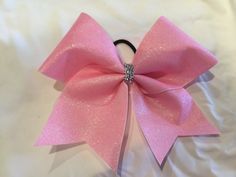 Pink Glitter Cheer Bows are hand made and can be ordered individually or in bulk. Perfect stiffness Great for large cheer squads. Browse now! Pink Cheer Bow, Pink Cheer Bows, Cute Cheer Bows, Cheer Season, Sideline Cheer, Cheerleading Bow, Cheer Hair Bows, Glitter Cheer Bow, Cheer Bag