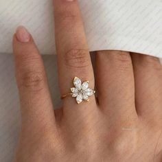 Dainty Sun Flowered Ring, Sunflower Engagement Ring, typically center around a round diamond, but they may sometimes center gemstones in other shapes, Gift For Her, Anniversary Gift,   Available Gold Color: Yellow Gold, White Gold, Rose Gold.   ✦ Ring Size: 4 1/4 - 8 1/2US/CA ✦ Gemstone: Moissanite ✦ Stone Weight : 1.4ct  Approx. ✦ Color: Colorless ✦ Clarity: VVS ✦ Gemstone: Lab Grown Diamond ✦ Stone Weight : 1.4ct  Approx. ✦ Color: G ✦ Clarity: SI ✦ SKU: MA-RIN0240 Metal Type: 925 Sterling Silv Sunflower Engagement Ring, Two Tone Ring, Handmade Fine Jewelry, Eco Friendly Jewelry, Gold Engagement Ring, Dream Jewelry, Flower Ring, Just Married, Gold Engagement