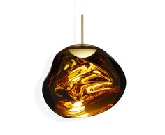 a brown glass light hanging from a ceiling