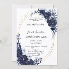 an elegant navy blue and gold wedding card with roses on the front, surrounded by greenery