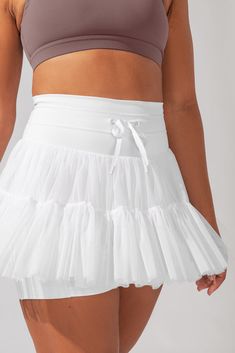 Ready, set, SERVE. Whether you’re on the court, in the studio, or on-the-go, the Pirouette Skort is the perfect skort to twirl and tone in. The Pirouette Skort is a Patented Design (patent no. US D1,010,983 S) created by Cassey Ho. All artwork and materials associated with the Pirouette Skort design are protected under the law. Compression Level: Performance Level: Popflex Pirouette Skort, Cute Skirts Outfits, Pirouette Skirt, Pirouette Skort, Skort Outfits, Exercise Essentials, Sisterhood Round, Mesh Skirts, Yoga Skirt