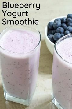 two glasses of blueberry yogurt smoothie next to each other