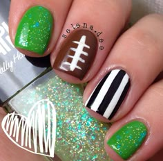 Football nails Football Themed Acrylic Nails, Color Street Football Nails, Nail Ideas Football, Purple And Gold Football Nails, Football Nail Art Designs, Football Season Nail Designs, Football Theme Nails, Red And Black Football Nails, Football Inspired Nails