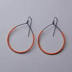 Bead & Steel Earrings - These bold hoops are made with deep orange, glass Miyuki Delica beads strung onto hand-forged steel. They feature oxidized sterling silver ear wires and ship with handmade earring backings for security. Red Seed Bead Earrings, Simple Bead Earrings, Bohemian Wedding Earrings, Tube Earrings, Wire Earrings Handmade, Orange Jewelry, Miyuki Delica Beads, Beaded Earrings Diy, Earrings Handmade Dangle