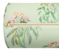 a floral print bag with gold zipper