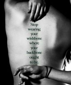 a woman's back with the words stop wearing your wishbones