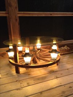 a glass table with lights on top of it