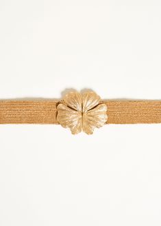 A metallic flower buckle blooms from a raffia weft to craft our gorgeous stretch belt. Adjustable Gold Fabric Belt, Gold Adjustable Belt For Spring, Elegant Fabric Belt For Beach, Elegant Fabric Beach Belt, Adjustable Gold Belt For Summer, Gold Adjustable Belt For Summer, Stretch Belt, Woven Raffia, Trendy Flowers