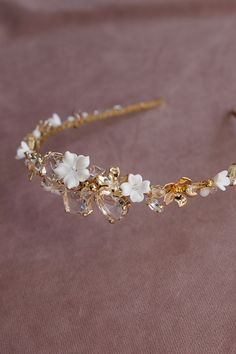 Filled with sparkling crystals and lots of gilded elements, a wedding headband, a bit in the boho style, but also fits into an elegant look, will beautifully decorate any wedding hairstyle. White flowers add charm and subtlety to the whole composition, which will certainly diversify the romantic wedding atmosphere. Length - 41 cm, width - 3.5 cm. Gold Wedding Hair Accessories, Gold Hair Accessories Wedding, Headpiece Wedding Hair, Bridal Halo, Wedding Hair Piece, Flower Crown Wedding, Wedding Hairstyle, Bridal Headpiece, Wedding Headband