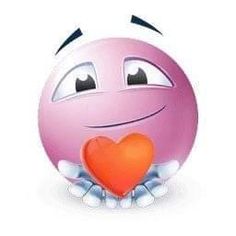 an emoticive smiley face holding a heart