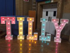 lighted letters spelling out the word joy