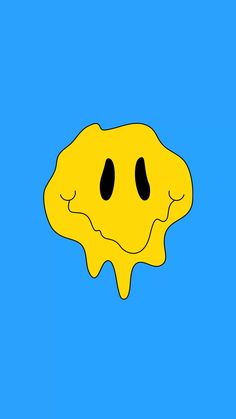 a yellow piece of food with two black eyes on it's face, against a blue background