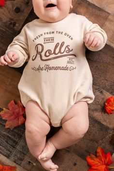 "This baby thanksgiving outfit will get lots of laughs!  Funny graphic is original to this shop :) Listing includes \"These rolls are homemade\" on your choice of piece: -  on natural bodysuit (short or long sleeve).   - sweatshirt romper - tshirt - oatmeal long romper  Sizes  See size chart in listing photos.   Printing  Most of the bodysuits are screenprinted.  The sweatshirt rompers, long rompers are all heatpressed with screenprint transfers.  Tees are screenprinted. ** Timing ** Super fast These Rolls Are Homemade Baby Picture, Homemade Rolls Onesie, Baby Onesies Cricut, Thanksgiving Onesie Ideas, Baby Boy Things, Newborn Outfits Boy, Thanksgiving Baby Shirts Vinyl, Baby Boy Stuff