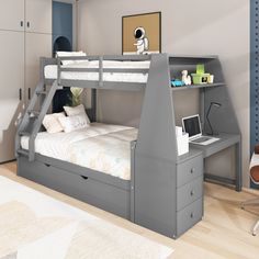 a bunk bed with a desk underneath it