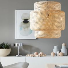 a light fixture hanging from the ceiling in a living room