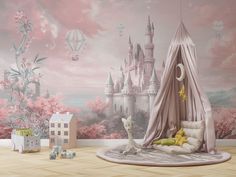 a child's bedroom decorated in pink and white with a castle mural on the wall