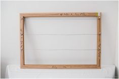 a wooden frame that has writing on it