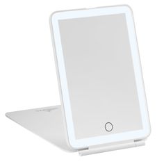 an electronic device with a white surface on it's back end and side view