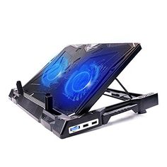 a laptop computer sitting on top of a stand