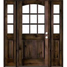 a wooden door with two sidelights and glass panels on the top part of it