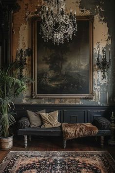 a living room with a couch, rug and chandelier in front of a painting