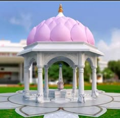 a pink and white gazebo sitting on top of a lush green field