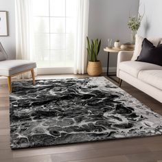 a black and white area rug in a living room