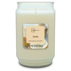 a white candle with vanilla on it