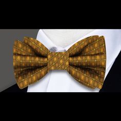 Dazzle and Delight: The Regal Gold Geometric Silk Bow Tie In the realm of sophistication and opulence, the Gold Geometric Silk Bow Tie reigns supreme. A testament to timeless elegance, this bow tie combines the richness of gold with a meticulously crafted geometric pattern. Prepare to make a statement that is both bold and refined as we explore the allure of this regal accessory, available to you in the form of a single bow tie or as part of a meticulously coordinated set. Golden Symphony: A Sil Yellow Fitted Bow Tie For Formal Occasions, Formal Gold Suit And Tie Accessories With Decorative Bow, Formal Yellow Bow Tie, Formal Fitted Yellow Bow Tie, Classic Gold Bow With Bow Tie Back, Formal Yellow Fitted Bow Tie, Gold Elegant Bow With Tie Back, Elegant Gold Bow With Ties, Gold Bow Ties For Black Tie Events